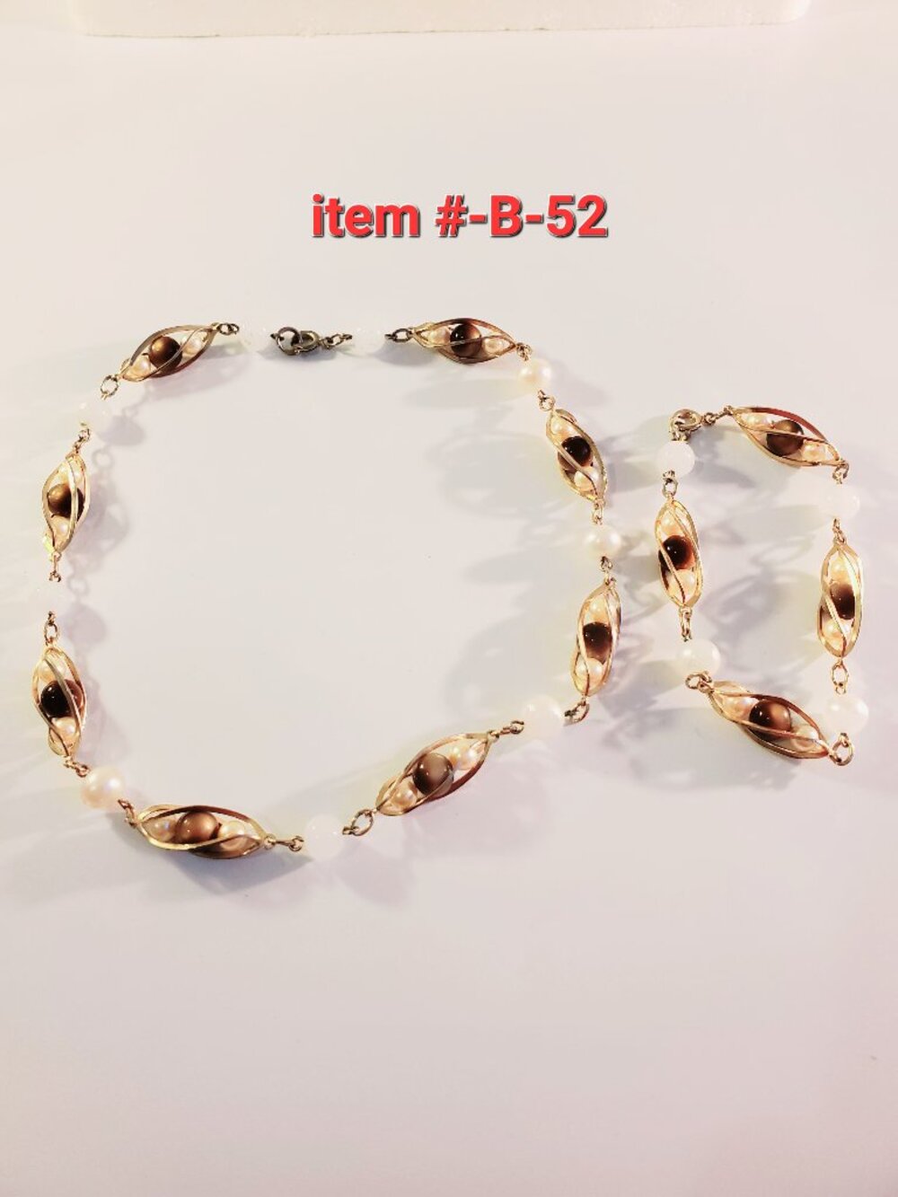 1 Gold Necklace with matching Gold Bracelet, item # B-52, .wt 28 grams.